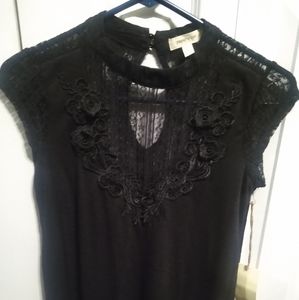 Very cute black dressy top with tags